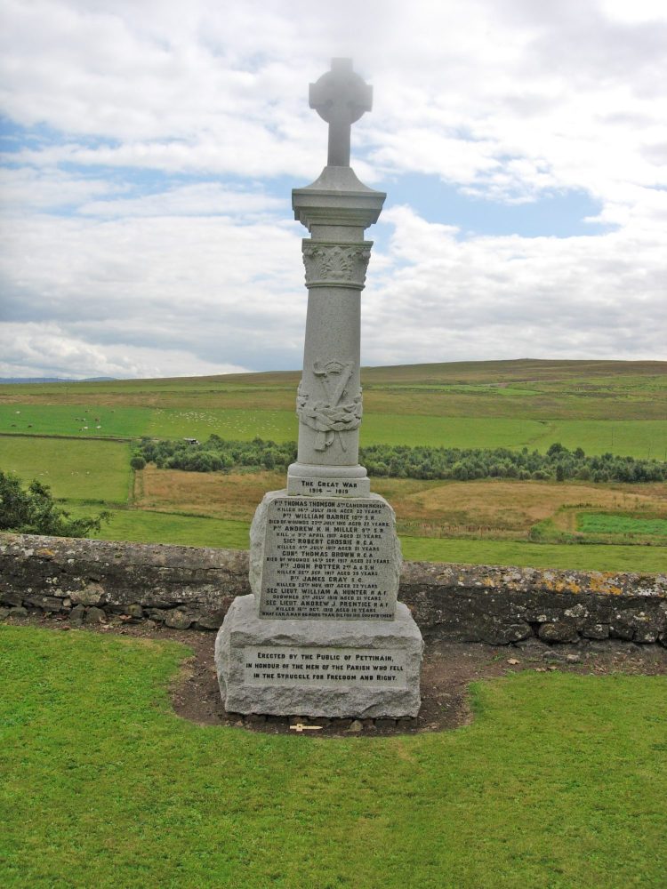 War Memorial which stands in the churchyard overlooking the surrounding countryside